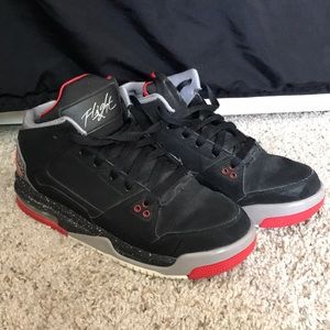 Black n red Jordans